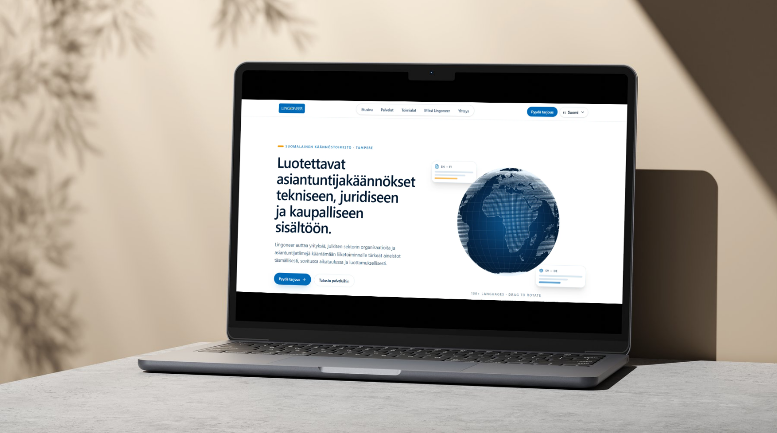 Lingoneer translation website displayed on a laptop in a warm minimal interior